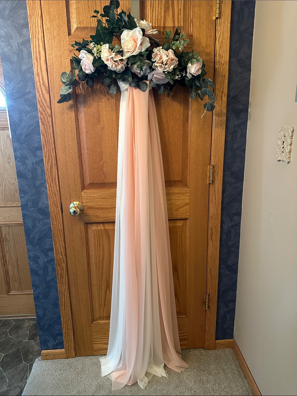 24" Floral Swag with blush roses with blush and white fabric drop on wire ring